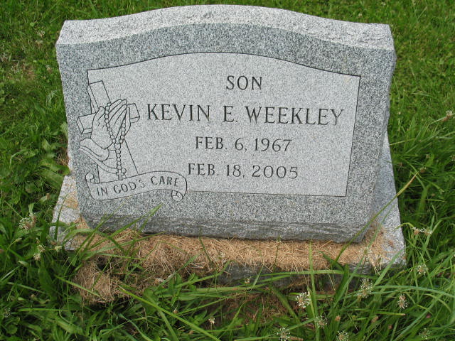 Kevin E. Weekley