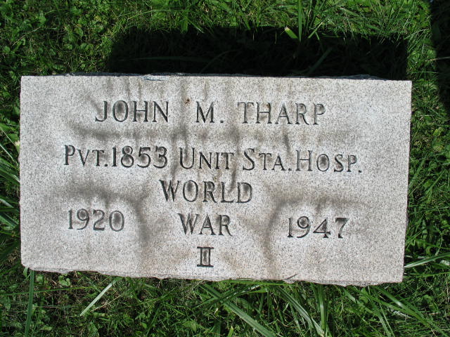 John M. Tharp