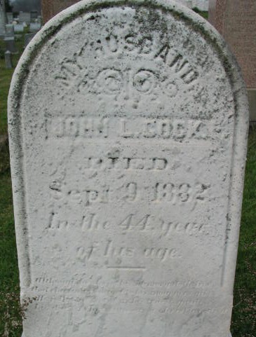 John L. Cock tombstone
